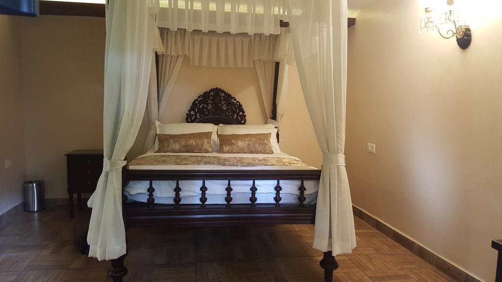 Casa Menezes - A Heritage Goan Homestay 巴姆博利姆 客房 照片